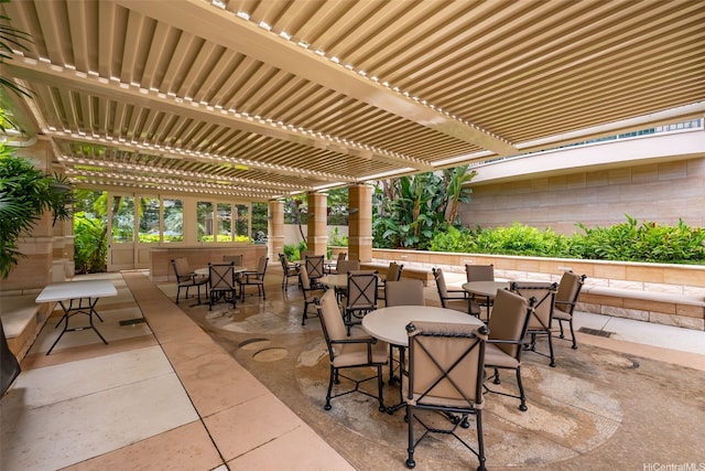 1740 S Beretania St Unit 10, Honolulu, HI 96826 - view of patio / terrace with outdoor dining area and a pergola