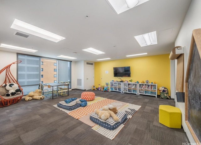 988 Halekauwila St Unit 1801, Honolulu, HI 96814 - playroom featuring carpet and a skylight