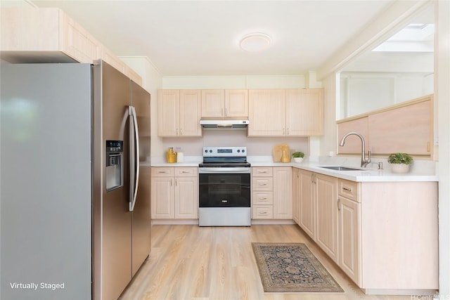 1645 Palamoi St, Pearl City, HI 96782 - kitchen featuring appliances with stainless steel finishes, a sink, under cabinet range hood, light wood finished floors, and light brown cabinetry