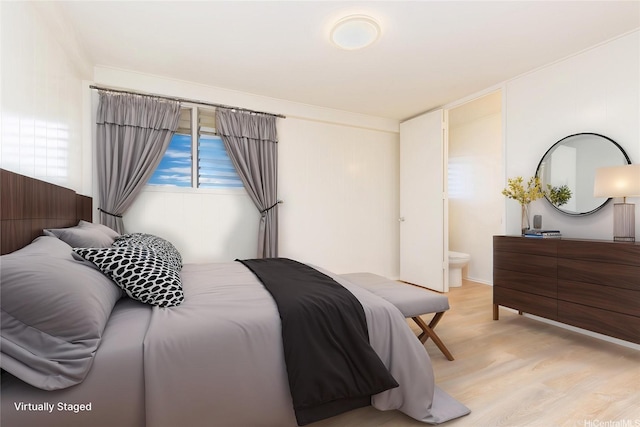 1645 Palamoi St, Pearl City, HI 96782 - bedroom with light wood-style flooring and ensuite bath