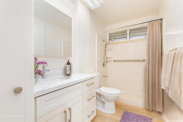 1645 Palamoi St, Pearl City, HI 96782 - bathroom featuring vanity, a stall shower, wood finished floors, and toilet