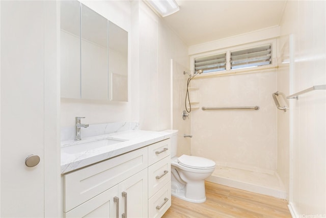 1645 Palamoi St, Pearl City, HI 96782 - bathroom with a stall shower, vanity, toilet, and wood finished floors