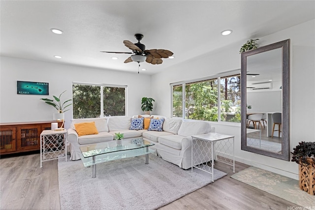 465A Kawailoa Rd, Kailua, HI 96734 - living area featuring a wall unit AC, plenty of natural light, a ceiling fan, wood finished floors, and recessed lighting
