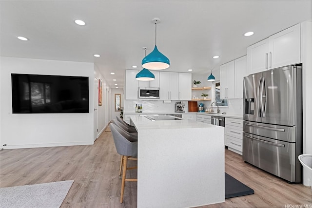 465A Kawailoa Rd, Kailua, HI 96734 - kitchen featuring stainless steel appliances, open shelves, light countertops, recessed lighting, and white cabinetry