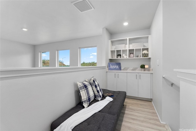 91-1669 Mee St, Ewa Beach, HI 96706 - living area featuring light wood finished floors and recessed lighting