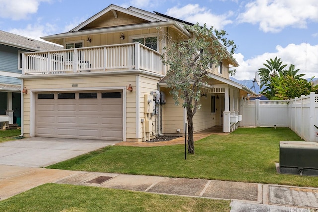 87-1038 Kaipoi St, Waianae, HI 96792 - view of front facade featuring a balcony, a garage, board and batten siding, and concrete driveway