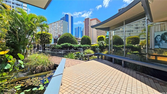 1550 Rycroft St Unit 323, Honolulu, HI 96814 - view of patio / terrace featuring a view of city