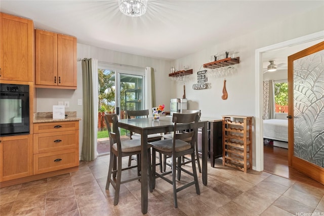 95-1031 Kuauli St Unit 87, Mililani, HI 96789 - dining area with healthy amount of natural light and a chandelier