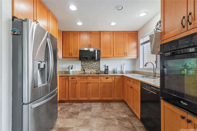 95-1031 Kuauli St Unit 87, Mililani, HI 96789 - kitchen featuring black appliances, a sink, light stone countertops, decorative backsplash, and brown cabinetry
