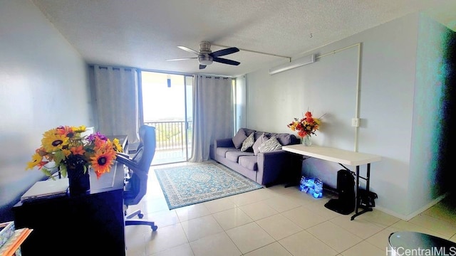 3161 Ala Ilima St Unit 2112, Honolulu, HI 96818 - tiled living room with ceiling fan and a textured ceiling