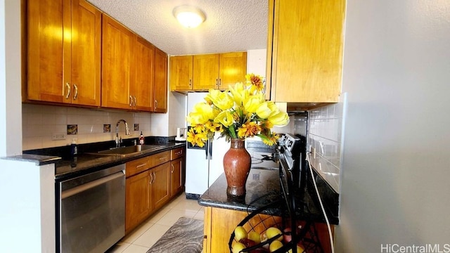 3161 Ala Ilima St Unit 2112, Honolulu, HI 96818 - kitchen with a sink, stainless steel dishwasher, tasteful backsplash, brown cabinetry, and a textured ceiling