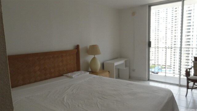 1920 Ala Moana Blvd Unit 1906, Honolulu, HI 96815 - tiled bedroom with access to outside and floor to ceiling windows