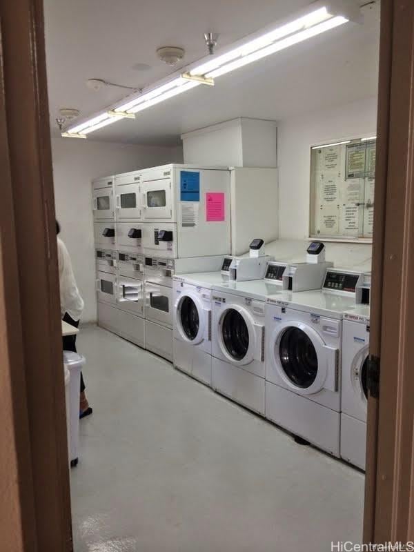 1920 Ala Moana Blvd Unit 1906, Honolulu, HI 96815 - communal laundry room with separate washer and dryer and stacked washer / drying machine