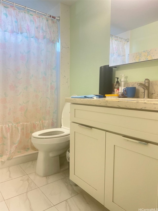 1133 Waimanu St Unit 911, Honolulu, HI 96814 - full bath with marble finish floors, vanity, toilet, and a shower with shower curtain