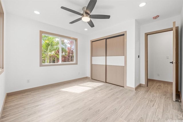 1528 Hooli Cir, Pearl City, HI 96782 - unfurnished bedroom featuring light wood-style flooring, a closet, recessed lighting, baseboards, and ceiling fan