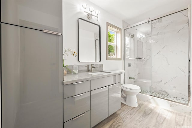 1528 Hooli Cir, Pearl City, HI 96782 - bathroom with toilet, a marble finish shower, vanity, and wood finished floors