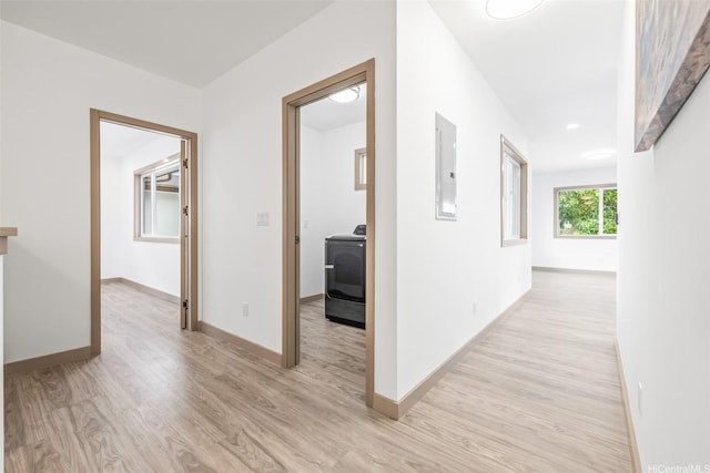 1528 Hooli Cir, Pearl City, HI 96782 - hall with washer / clothes dryer, electric panel, light wood-style floors, and baseboards