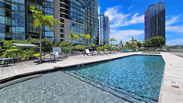 1001 Queen St Unit 2605, Honolulu, HI 96814 - community pool featuring a wooden deck