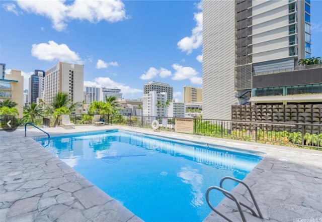 2140 Kuhio Ave Unit 1808, Honolulu, HI 96815 - community pool featuring a view of city
