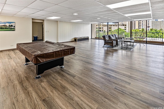 411 Hobron Ln Unit 3905, Honolulu, HI 96815 - game room with a paneled ceiling, pool table, expansive windows, wood finished floors, and baseboards
