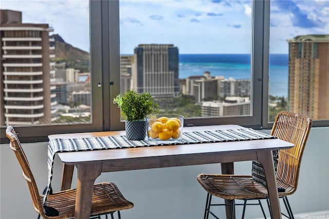 411 Hobron Ln Unit 3905, Honolulu, HI 96815 - dining space with a city view, healthy amount of natural light, and a water view