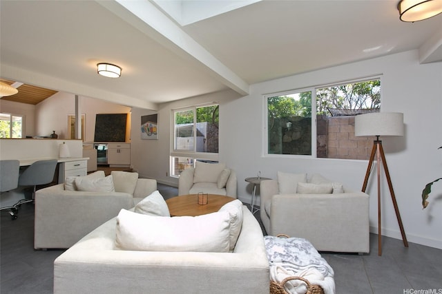 759 Elepaio St, Honolulu, HI 96816 - tiled living room with plenty of natural light, an office area, and baseboards