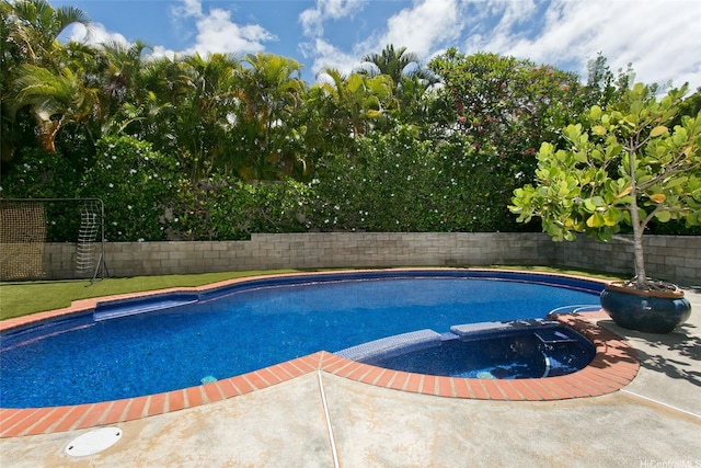 759 Elepaio St, Honolulu, HI 96816 - view of pool with a pool with connected hot tub and a fenced backyard