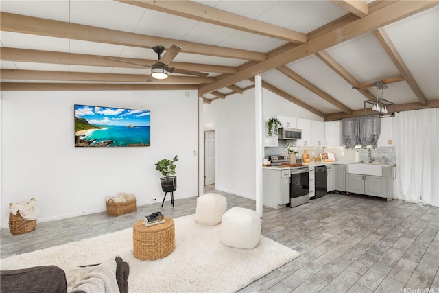 87-1705 Mohihi St, Waianae, HI 96792 - kitchen featuring stainless steel appliances, light countertops, light wood-type flooring, and ceiling fan