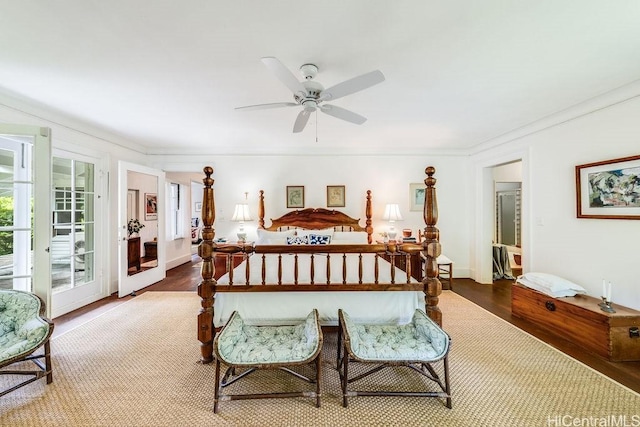 247 Dowsett Ave, Honolulu, HI 96817 - bedroom with access to outside, dark wood-type flooring, ornamental molding, and ceiling fan