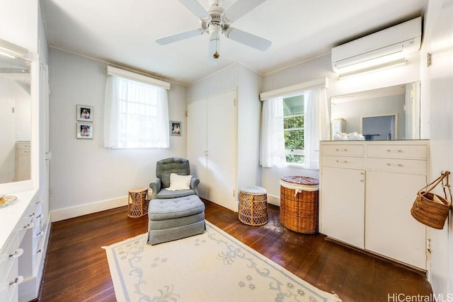 247 Dowsett Ave, Honolulu, HI 96817 - living area featuring a wall mounted AC, dark wood-style floors, plenty of natural light, ceiling fan, and crown molding