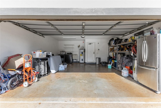 95-1039 Palamoa St Unit 107, Mililani, HI 96789 - garage featuring freestanding refrigerator, electric water heater, washer and clothes dryer, and a sink