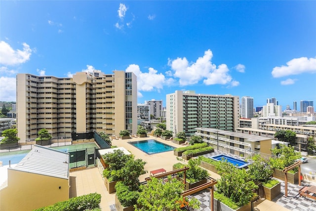 1717 Mott Smith Dr Unit 707, Honolulu, HI 96822 - community pool featuring a view of city