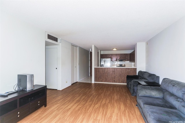 1717 Mott Smith Dr Unit 707, Honolulu, HI 96822 - living room featuring light wood-style flooring