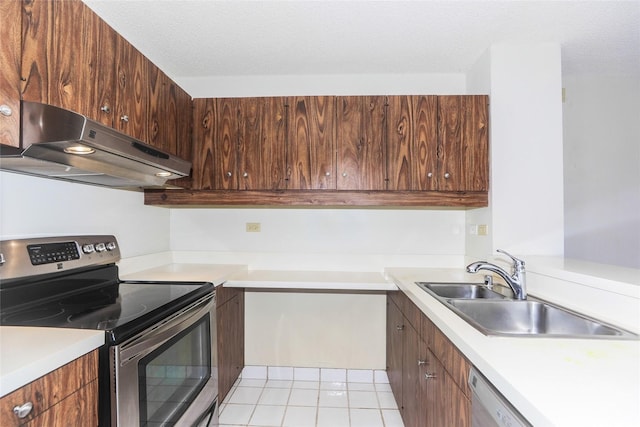 1717 Mott Smith Dr Unit 707, Honolulu, HI 96822 - kitchen featuring appliances with stainless steel finishes, under cabinet range hood, and light countertops