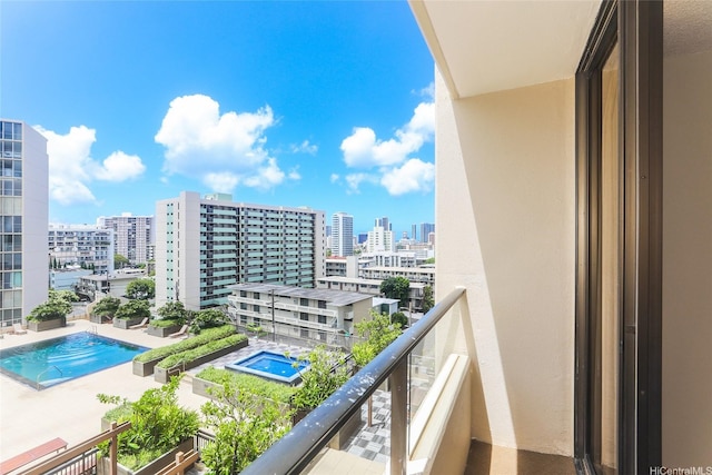 1717 Mott Smith Dr Unit 707, Honolulu, HI 96822 - balcony with view of pool area and a city view