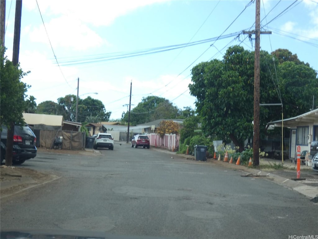 94-125 Pahu St Unit 11, Waipahu, HI 96797 - view of asphalt street featuring street lighting and sidewalks