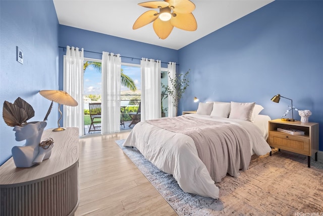 7007 Hawaii Kai Dr Unit A16, Honolulu, HI 96825 - bedroom with access to outside, wood finished floors, and a ceiling fan