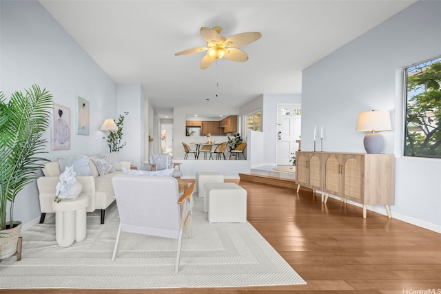 7007 Hawaii Kai Dr Unit A16, Honolulu, HI 96825 - living area with light wood-type flooring, ceiling fan, and baseboards