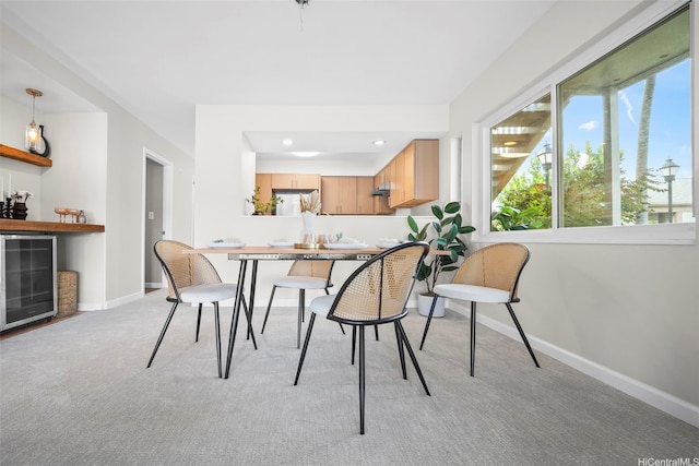 7007 Hawaii Kai Dr Unit A16, Honolulu, HI 96825 - dining space with baseboards, light carpet, wine cooler, a bar, and recessed lighting