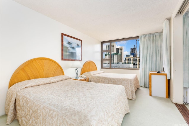201 Ohua Ave Unit 1012Tower-I, Honolulu, HI 96815 - bedroom with a view of city and carpet flooring