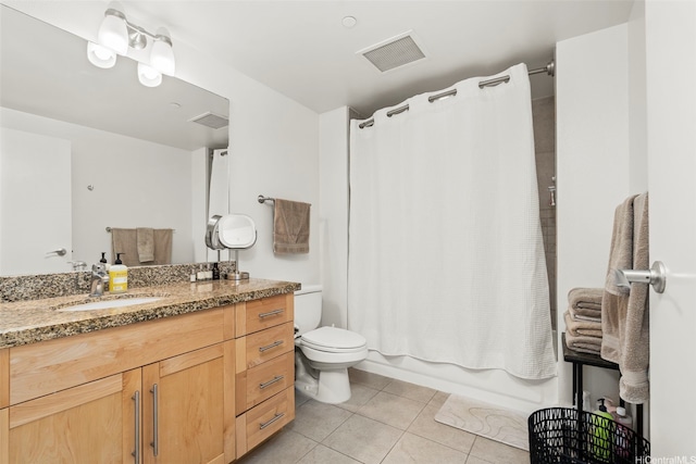 600 Queen St Unit 607, Honolulu, HI 96813 - bathroom featuring tile patterned floors, vanity, toilet, and shower / bath combo with shower curtain