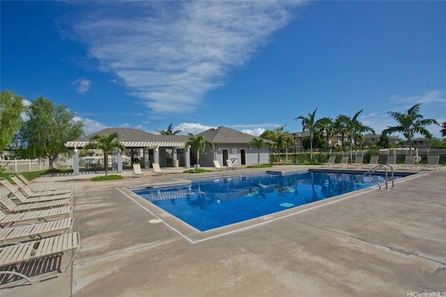 91-1200 Keaunui Dr Unit 400, Ewa Beach, HI 96706 - community pool with a patio area and a pergola