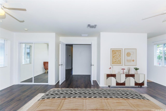 91-1200 Keaunui Dr Unit 400, Ewa Beach, HI 96706 - bedroom with wood finished floors, a closet, and ceiling fan