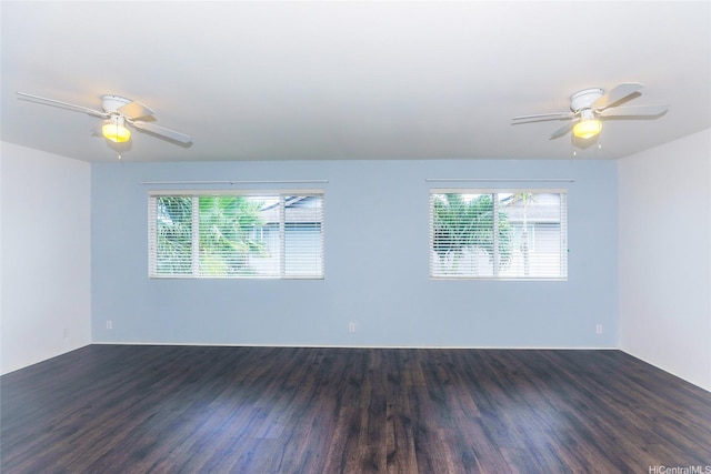 91-1200 Keaunui Dr Unit 400, Ewa Beach, HI 96706 - spare room with plenty of natural light, dark wood finished floors, a ceiling fan, and baseboards