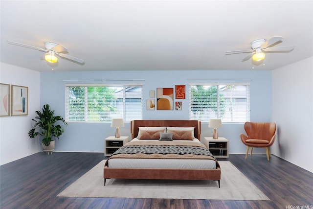 91-1200 Keaunui Dr Unit 400, Ewa Beach, HI 96706 - bedroom featuring wood finished floors, multiple windows, and a ceiling fan
