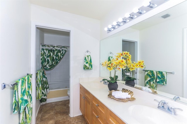 91-1200 Keaunui Dr Unit 400, Ewa Beach, HI 96706 - full bathroom with double vanity, toilet, shower / bathtub combination with curtain, and baseboards