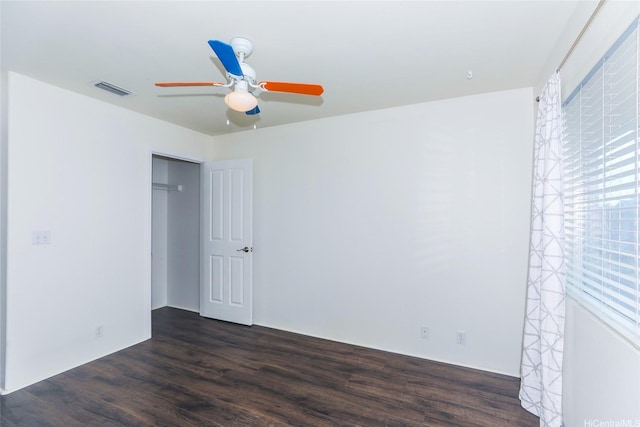 91-1200 Keaunui Dr Unit 400, Ewa Beach, HI 96706 - unfurnished room with dark wood finished floors and ceiling fan