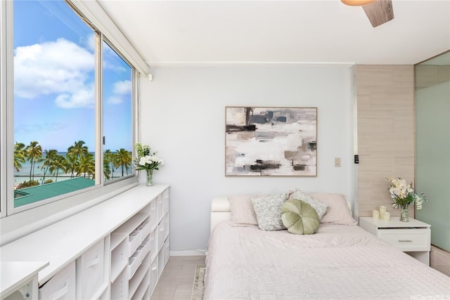 2500 Kalakaua Ave Unit 504, Honolulu, HI 96815 - bedroom with ceiling fan and baseboards