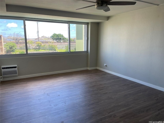 2888 Ala Ilima St Unit 910, Honolulu, HI 96818 - spare room with ceiling fan, baseboards, dark wood finished floors, and a wall mounted AC