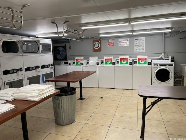 2888 Ala Ilima St Unit 910, Honolulu, HI 96818 - shared laundry with stacked washer / drying machine, washer and dryer, and light tile patterned floors